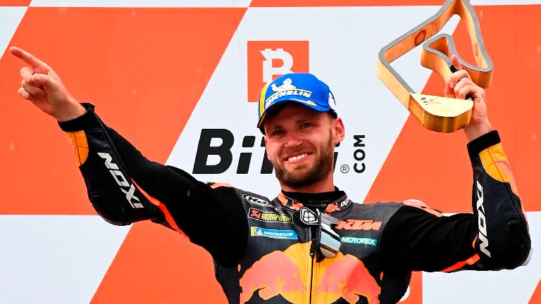 Winner KTM rider Brad Binder celebrates on the podium after winning the Austrian MotoGP at the Red Bull Ring in Spielberg, Austria. – AFPPIX