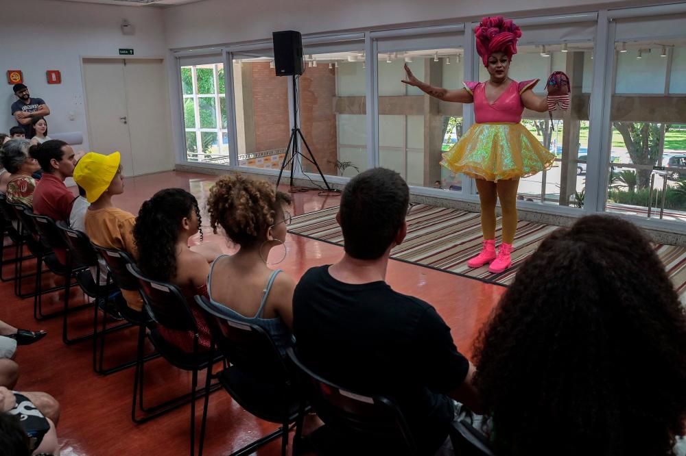 Brazilian drag queen Paulo Reis, known as Helena Black, performs at the SESI theatre in Sao Jose dos Campos, Sao Paulo State, Brazil, on December 2, 2023/AFPPix