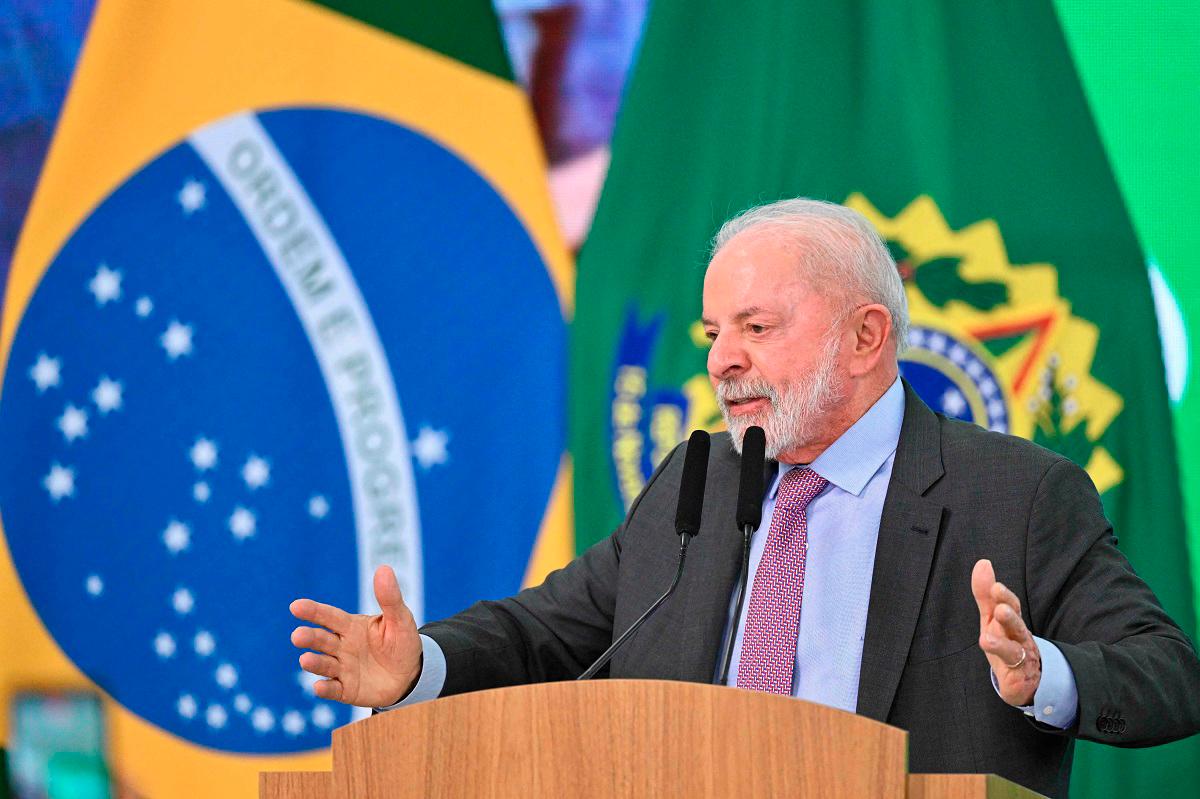 Brazil’s President Luiz Inacio Lula da Silva delivers a speech during the launch of a home renovation program for low-income families at Planalto Palace in Brasilia on October 20, 2025. - AFP
