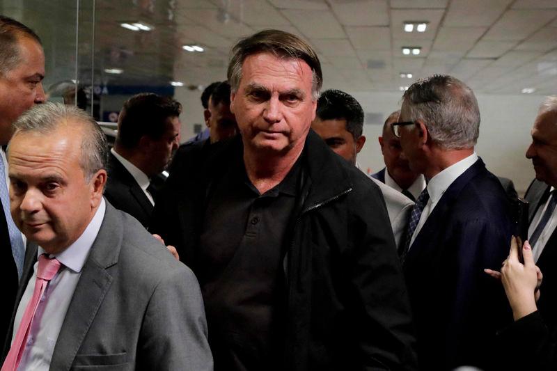 Former Brazil's President Jair Bolsonaro (C) arrives at the Federal Senate to have lunch with leaders of opposition parties in Brasilia on February 18, 2025. - AFPPIX