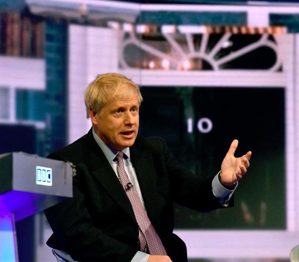 Conservative Party leadership contender Conservative MP Boris Johnson speaks during a BBC television leadership debate in London on June 18, 2019.