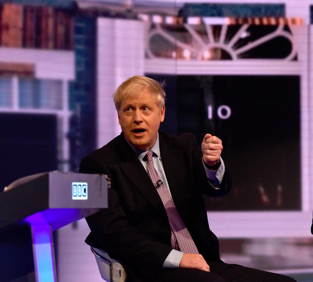 Conservative Party leadership contender Conservative MP Boris Johnson speaks during a BBC television leadership debate in London on June 18, 2019. — AFP