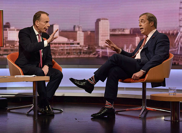 In a handout picture released by the BBC in London on Nov 2, 2019, Britain’s Brexit Party leader Nigel Farage (R) is pictured as he is interviewed on the BBC political programme The Andrew Marr Show. — AFP