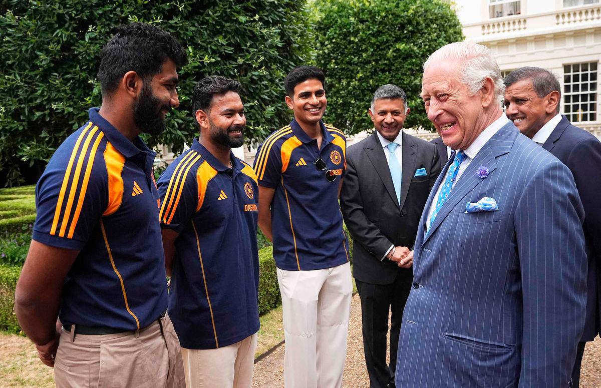 Britain’s King Charles III meets members of the India men’s Test cricket team (L-R) Jasprit Bumrah, Rishabh Pant and Captain Shubman Gill during an audience in the gardens of Clarence House, London on July 15, 2025. (Photo by Aaron Chown / POOL / AFP)
