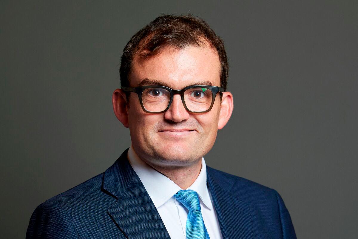 An undated handout photograph released by the UK Parliament shows Conservative MP for Central Suffolk and North Ipswich, Patrick Spencer, posing for an official portrait photograph at the Houses of Parliament in London. A lawmaker from Britain’s opposition Conservative party has been charged with committing sexual assault at a renowned private members club in London, prosecutors announced on Tuesday. - AFP