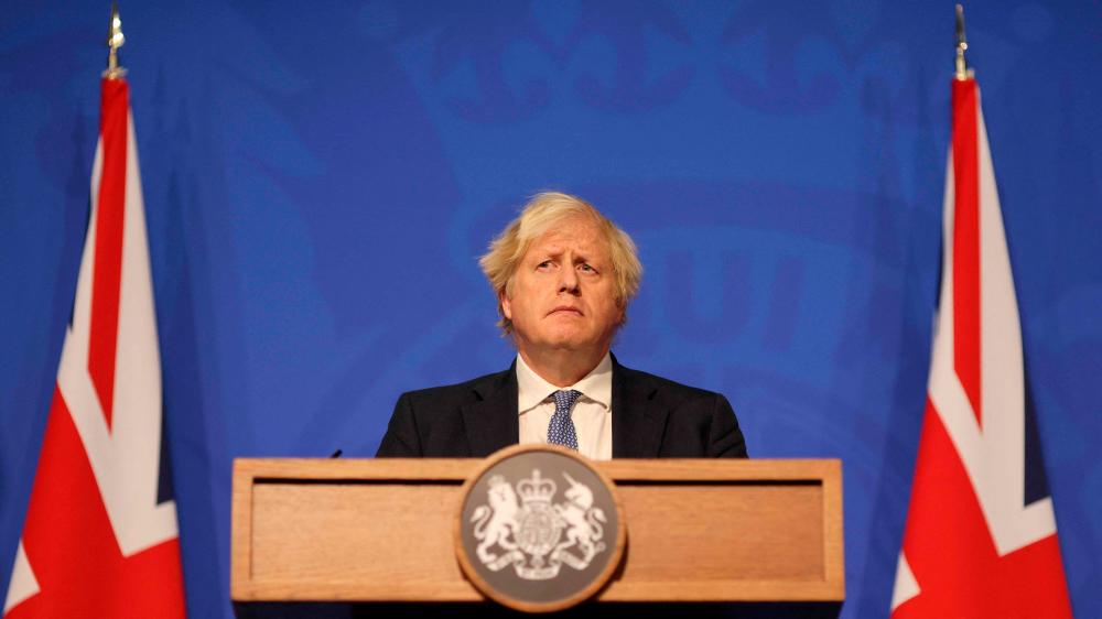 Britain's Prime Minister Boris Johnson holds a press conference for the latest Covid-19 update in the Downing Street briefing room in central London on December 8, 2021. The UK government is reintroducing Covid-19 restrictions due to the Omicron variant. AFPpix