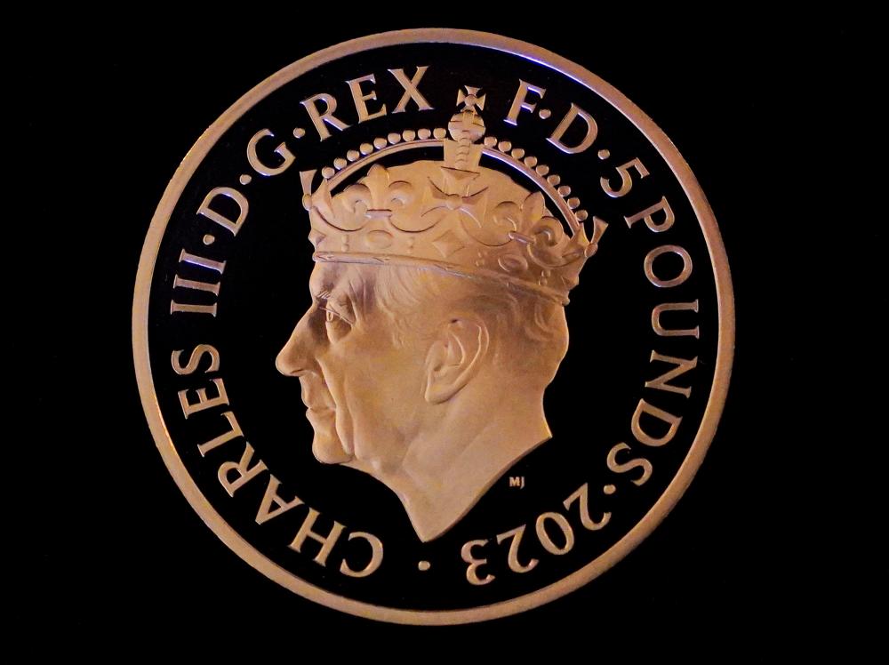 A picture shows the first struck £5 Coronation coin, which was presented to Britain’s King Charles III at Windsor Castle, west of London on April 13, 2023. AFPPIX