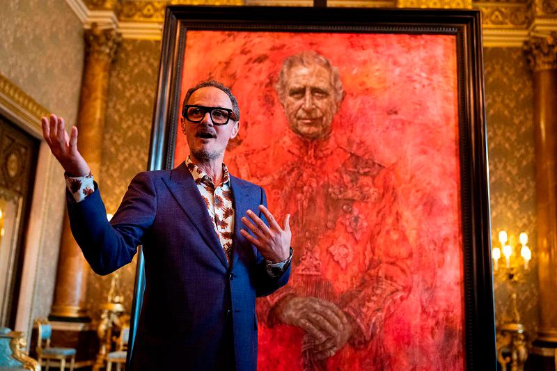 Artist Jonathan Yeo stands in front of his official portrait of Britain’s King Charles III wearing the uniform of the Welsh Guards, of which he was made Regimental Colonel in 1975, in the Blue Drawing Room at Buckingham Palace in London on May 14, 2024. - AFPpix