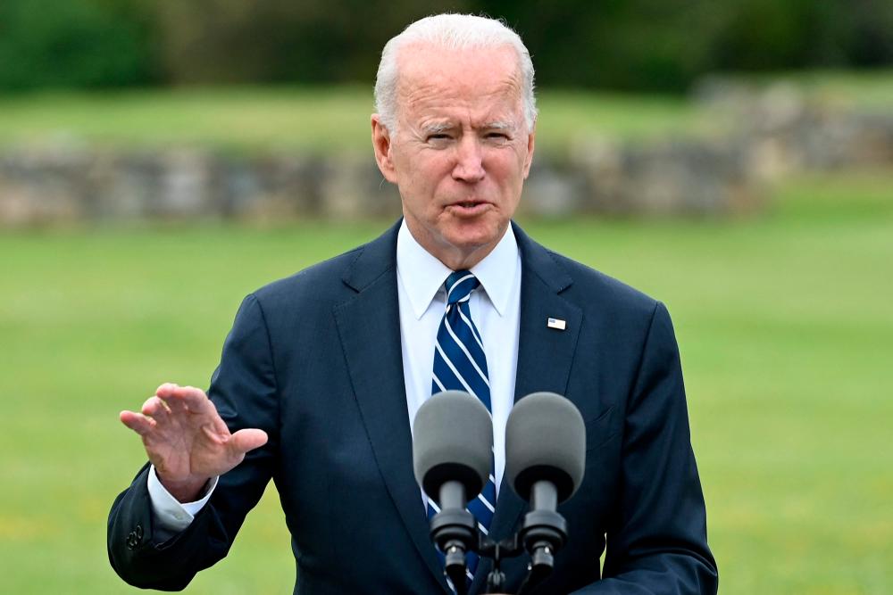 US President Joe Biden delivers a speech on the COVID-19 pandemic, in St Ives, Cornwall on June 10, 2021, ahead of the three-day G7 summit being held from 11-13 June. G7 leaders from Canada, France, Germany, Italy, Japan, the UK and the United States meet this weekend for the first time in nearly two years, for the three-day talks in Carbis Bay, Cornwall. – AFP