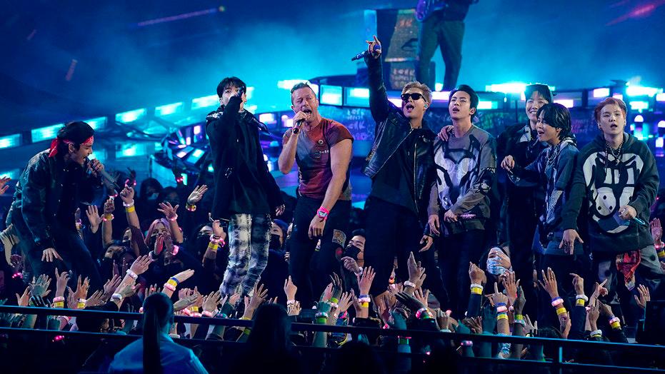 BTS performed with rock group, Coldplay during their appearance at the AMAs. — PHOTO COURTESY OF AP $!BTS performed with rock group, Coldplay during their appearance at the AMAs. — PHOTO COURTESY OF AP