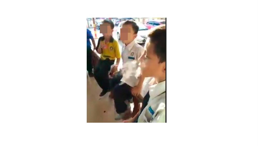 Screenshot of the students smoking the candy-like cigarette.