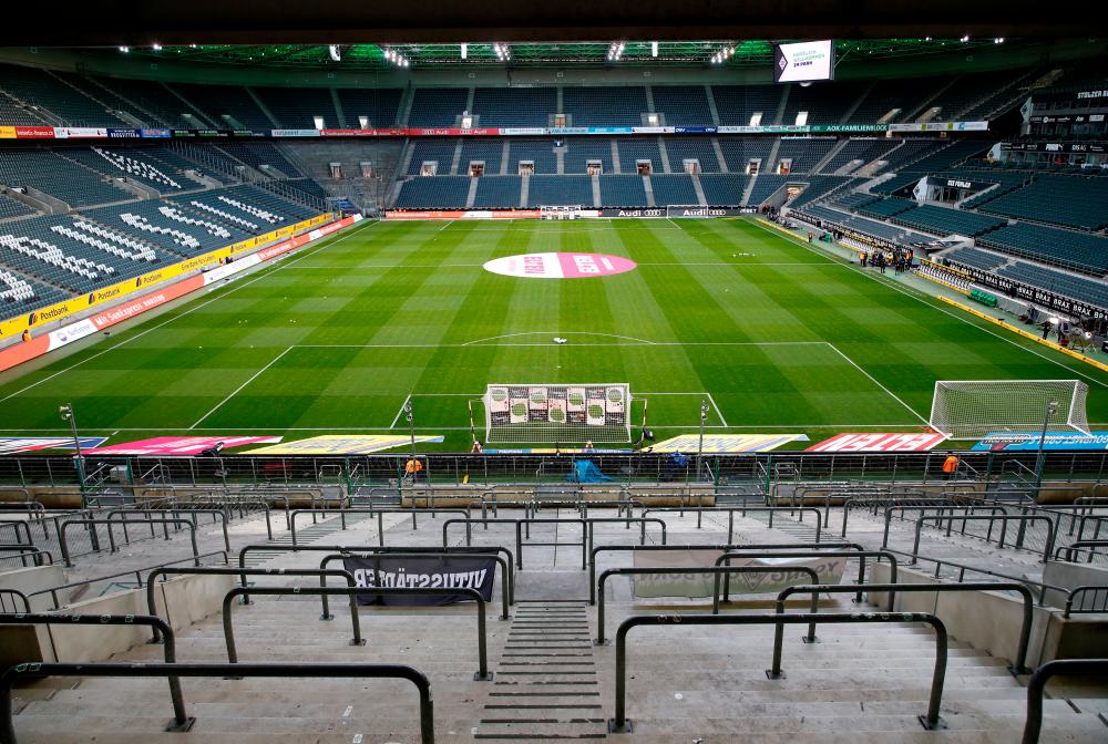 General view of empty stands inside the stadium before the match that will be played behind closed while the number of coronavirus cases grow around the world. Picture from March 11, 2020. - Reuters