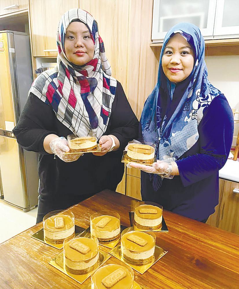 $!Purple Love Bakery cofounder Nurul Aliza (left) and founder Sarah Shazlin