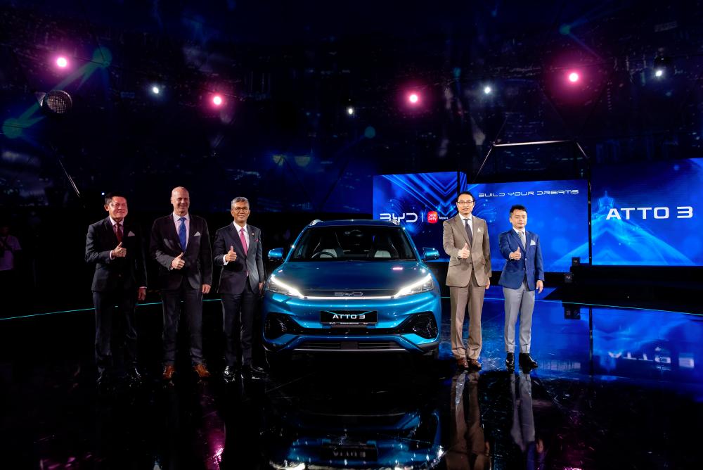 From left: Sime Darby Motors Malaysia managing director (retail &amp; distribution) Jeffrey Gan; managing director Andrew Basham, Minister of International Trade and Industry Tengku Datuk Seri Zafrul Tengku Abdul Aziz, BYD Asia-Pacific auto sales division general manager Liu Xueliang and Eagle Zhao, managing director of BYD Malaysia Sdn Bhd and PT BYD Motor Indonesia at the launch on Dec 8.