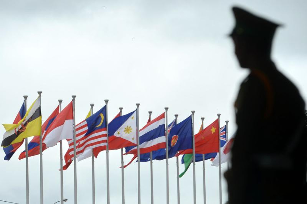 Lao police security stands guard at the entrance to the Association of Southeast Asian Nations (Asean) Summit in Vientiane on Sept 7, 2016. - AFPpix