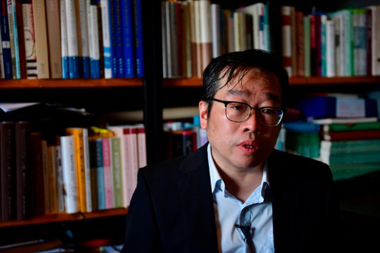 Wu Qiang was fired from the prestigious Tsinghua university shortly after he conducted fieldwork at the Occupy Central protests in Hong Kong. — AFP