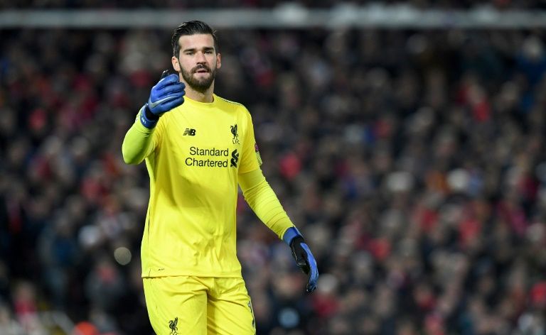 Liverpool boss Jurgen Klopp hailed goalkeeper Alisson for his wonder save against Napoli. — AFP