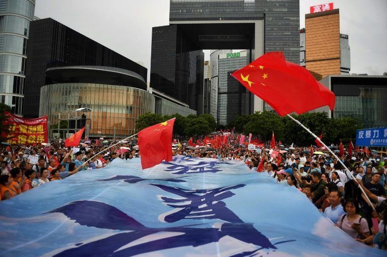 A rally by pro-government supporters in Hong Kong this weekend illustrated the polarisation coursing through the city. — AFP