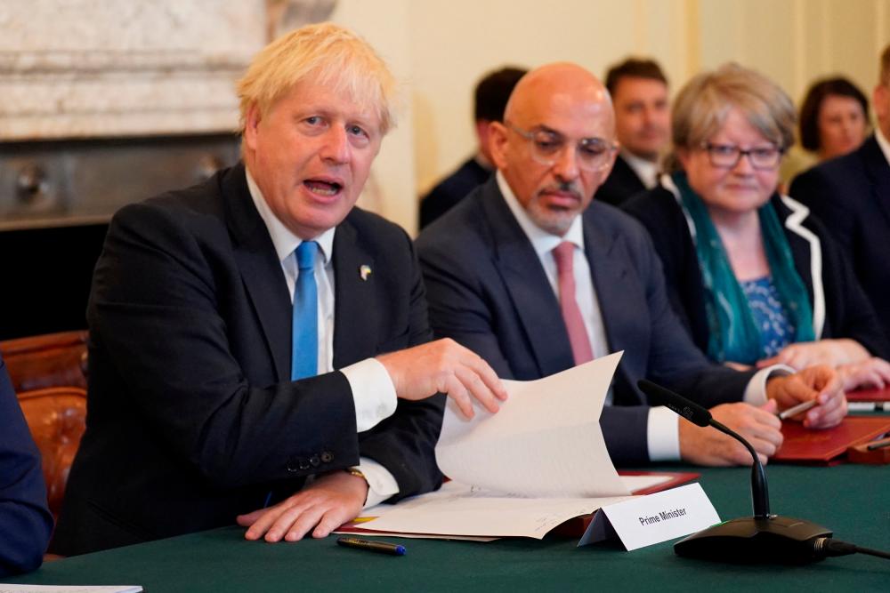 From left: Johnson, Zahawi and Work and Pensions Secretary Therese Coffey attend a Cabinet meeting at 10 Downing Street, London, yesterday. – Pool pix via Reuters