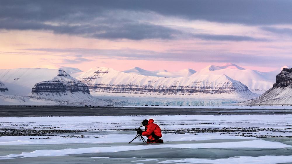 Camera Operator Steve Gute photographs the Tempelfyorden, Svalbard, Norwegian Territory- HBO