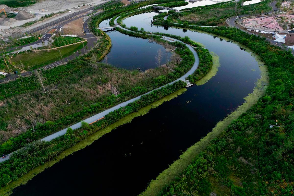 An aerial view of the Don River in the newly unveiled Biidaasige Park, part of Toronto’s Port Lands Flood Protection Project, in Toronto, Ontario, Canada, on July 18, 2025. - Cole BURSTON / AFP