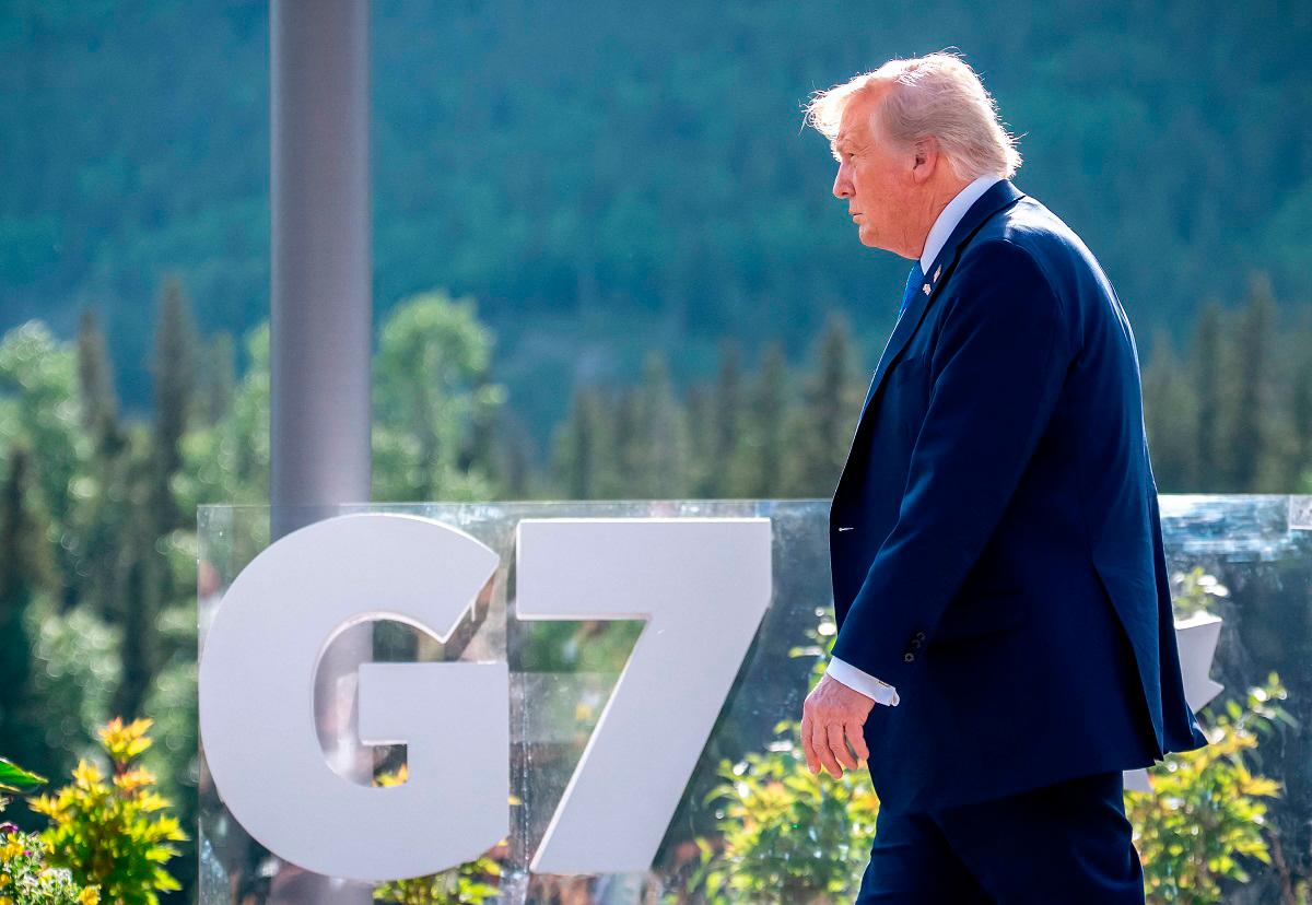 US President Donald Trump arrives for a family photo during the Group of Seven (G7) Summit at the Kananaskis Country Golf Course in Kananaskis, Alberta, Canada on June 16, 2025. - Michael Kappeler / POOL / AFP