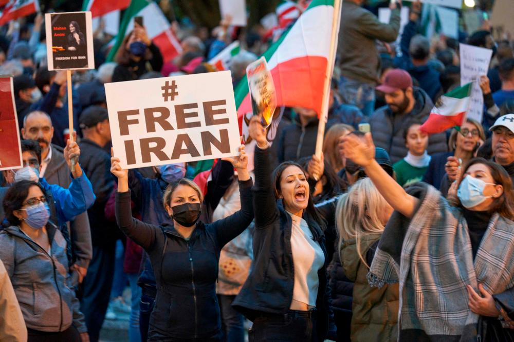 People demonstrate against the Iranian regime during a protest at Mel Lastman Square in Toronto, Ontario, September 24, 2022. AFPPIX