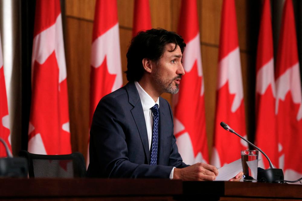 Canadian Prime Minister Justin Trudeau speaks during a news conference April 16, 2021 in Ottawa, Canada.- AFP