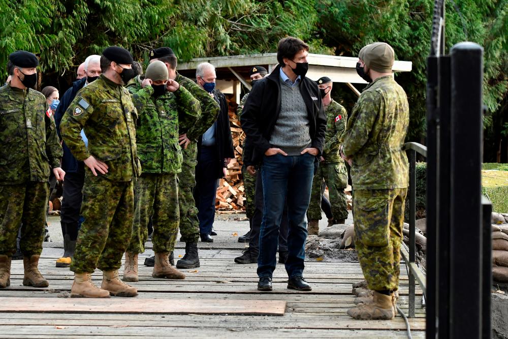 Canada's Prime Minister Justin Trudeau visits Abbottsford after rainstorms lashed the western Canadian province of British Columbia, triggering landslides and floods, shutting highways, in Abbottsford, British Columbia, Canada, November 26, 2021. -REUTERSPix