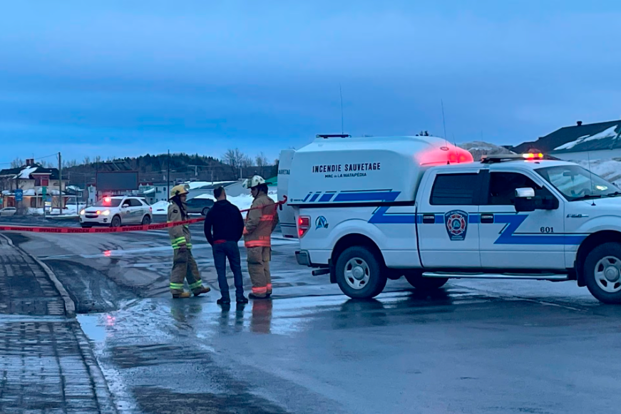 [2/2] Firefighters stand near the site where a man ran down a group of pedestrians with a van in the in the Lower St. Lawrence region of Amqui, Quebec, Canada on March 13, 2023. REUTERSPIX
