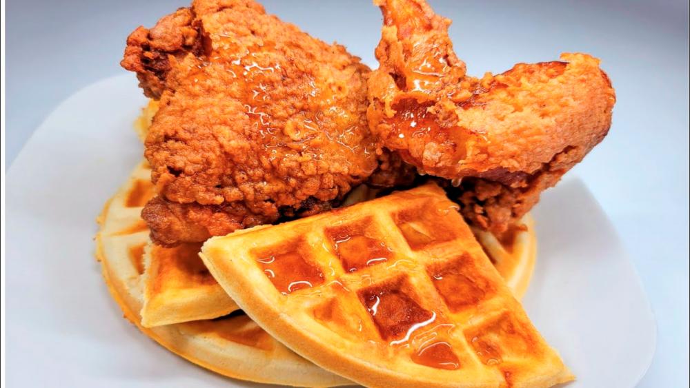 $!Waffles create a delightful sweet combination when paired with crispy chicken. – PIC FROM YOUTUBE @CANDY THA GLAM COOK