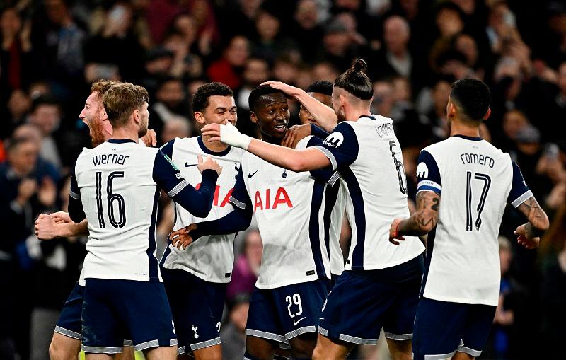 Tottenham Hotspur's Pape Matar Sarr celebrates scoring their second goal with teammates. - REUTERS/Dylan Martinez