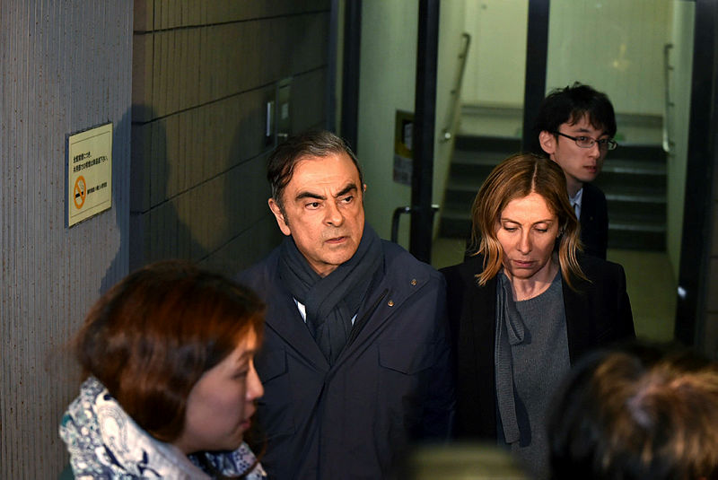 In this file photo taken on April 3, 2019, former Nissan Chairman Carlos Ghosn (2nd L) and his wife Carole (2nd R) leave the office of his lawyer in Tokyo. Not so long ago in May 2018. — AFP