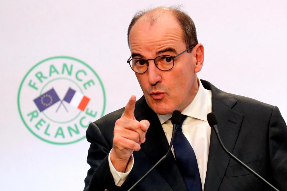Castex speaks during a news conference to present his government's economic recovery plan from the Covid-19 pandemic, in Paris today. POOL pix VIA REUTERS