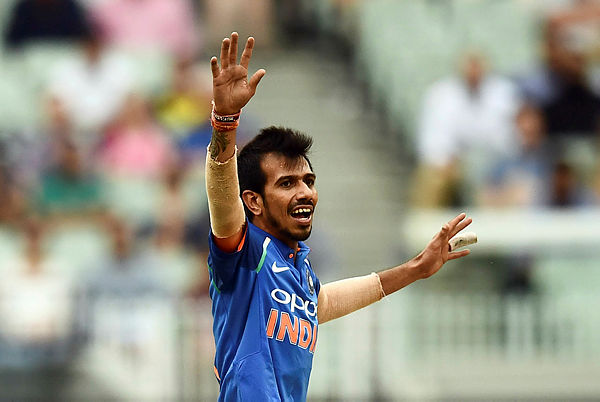India’s Yuzvendra Chahal celebrates after dismissing Australia’s Peter Handscomb during the third one-day international cricket match between Australia and India at the Melbourne Cricket Ground. — AFP