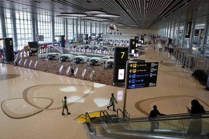 General view of check-in area of Changi Airport Terminal 4. Terminal 5, handling up to 50 million passengers a year in its initial phase, had been due for completion around 2030. – REUTERFSPIX