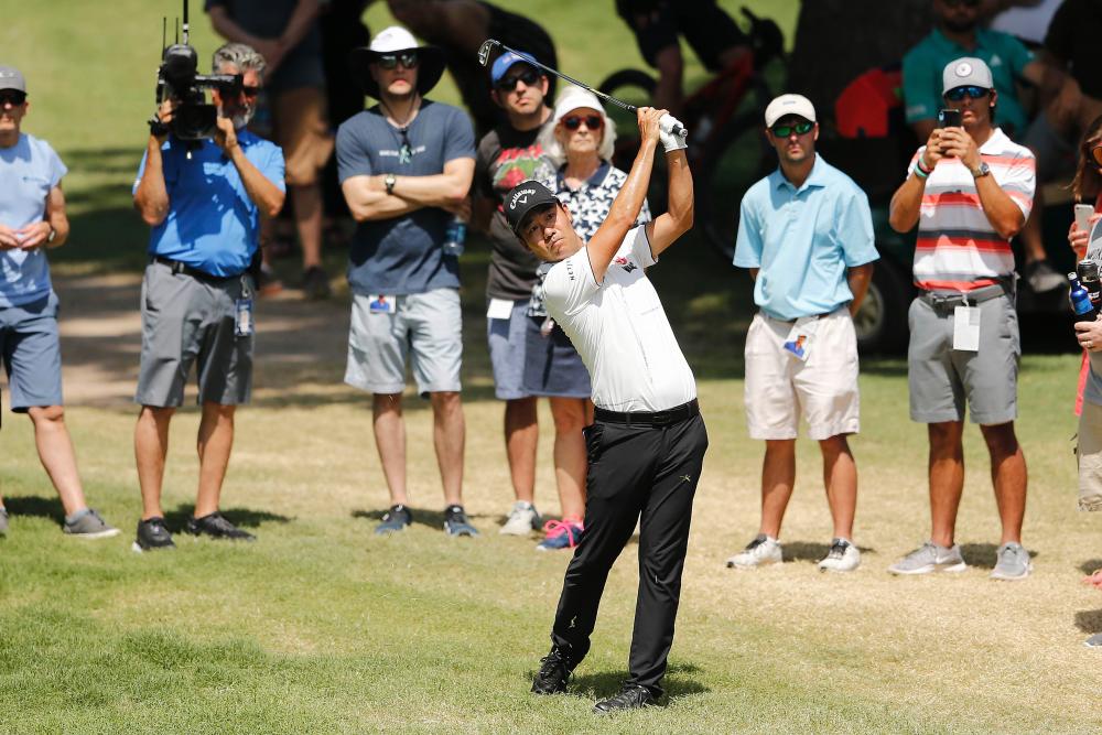 Kevin Na of the United States plays a shot on the 12th hole during the third round of the Charles Schwab Challenge at Colonial Country Club on May 25, 2019 in Fort Worth, Texas. - AFP