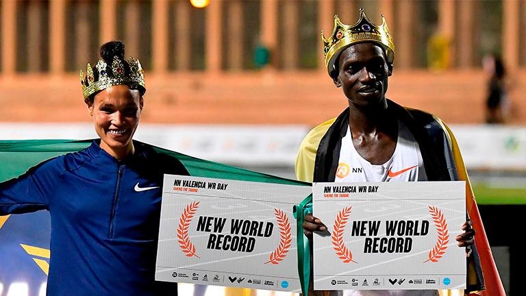 Ethiopian athlete Letesenbet Gidey (left) and Ugandan athlete Joshua Cheptegei pose after breaking the 5,000m and 10,000m track world records, respectively, during the NN Valencia World Record Day at the Turia stadium in Valencia. – AFPPIX