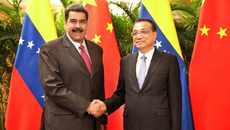 Venezuela’s President Nicolas Maduro and Chinese Premier Li Keqiang shake hands during their meeting in Beijing, China Sep 14, 2018. — Reuters