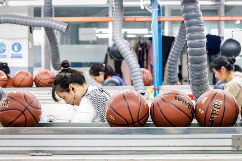 For representational purposes only. Employees produce basketballs that will be exported to Europe at a factory in Sihong, in eastern China’s Jiangsu province on March 25, 2025.AFPpix