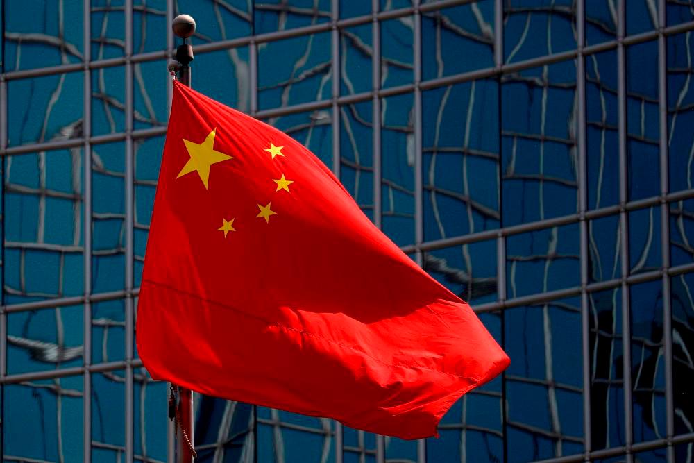 FILE PHOTO: The Chinese national flag is seen in Beijing, China April 29, 2020. REUTERSpix