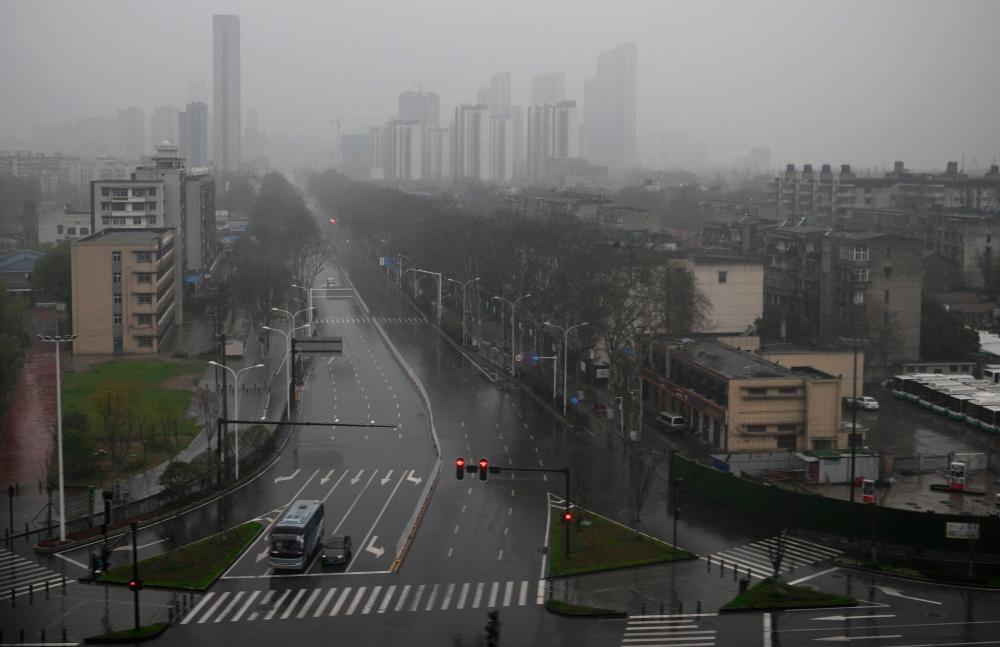 A general view shows an empty street in Wuhan, China's central Hubei province on March 8, 2020. - AFP