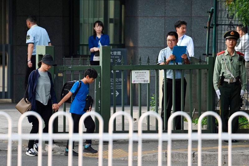 A 10-year-old Japanese schoolboy living in Shenzhen was stabbed in the street on his way to class on Sept 18 - AFPpix