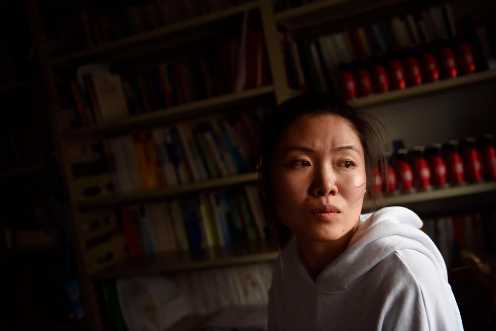 This photo taken on Dec 6, 2019 shows former massage therapist Xiao Jia at the Disabled Associated Women’s Support Group (DAWS) office in Beijing. — AFP