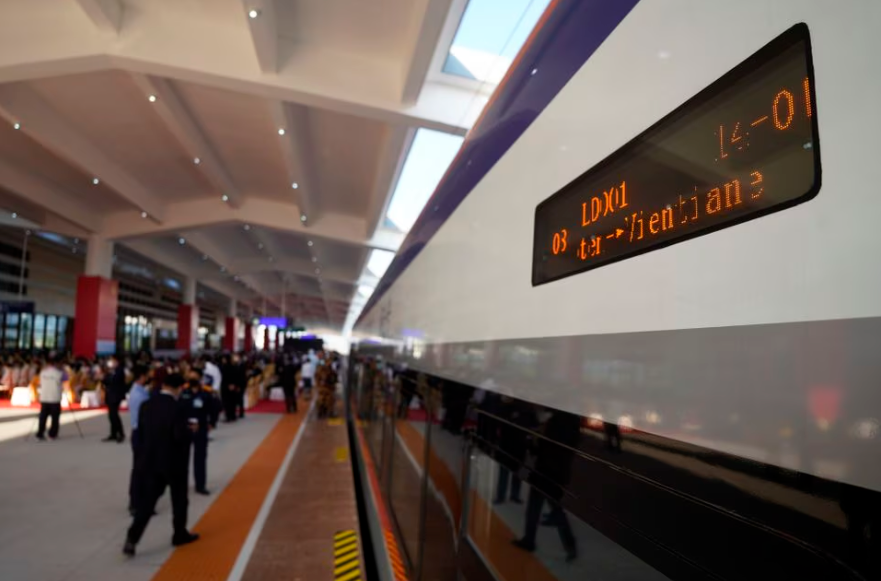 A sign on a train is pictured during a Buddhist ceremony one day prior to the handover ceremony of the high-speed rail project linking the Chinese southwestern city of Kunming with Vientiane, in Vientiane, Laos, December 2, 2021. REUTERSpix