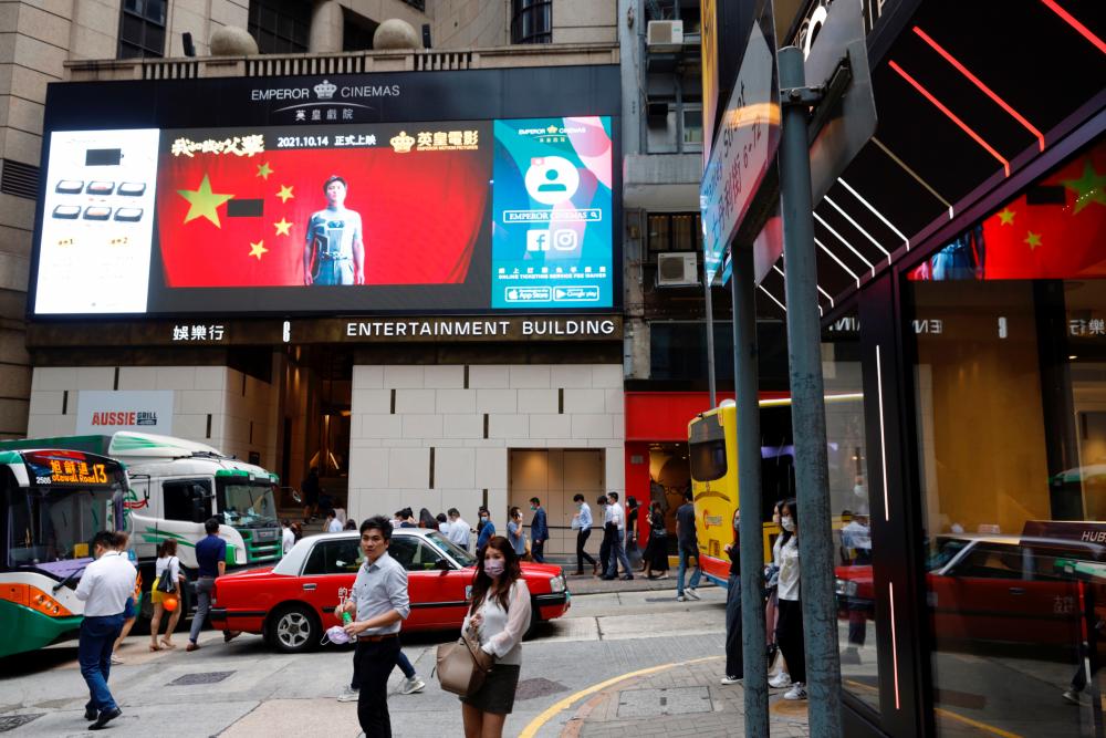 The trailer of Chinese movie 'My Country, My Parents' is seen outside a cinema, in Hong Kong, China. October 27, 2021. REUTERSpix