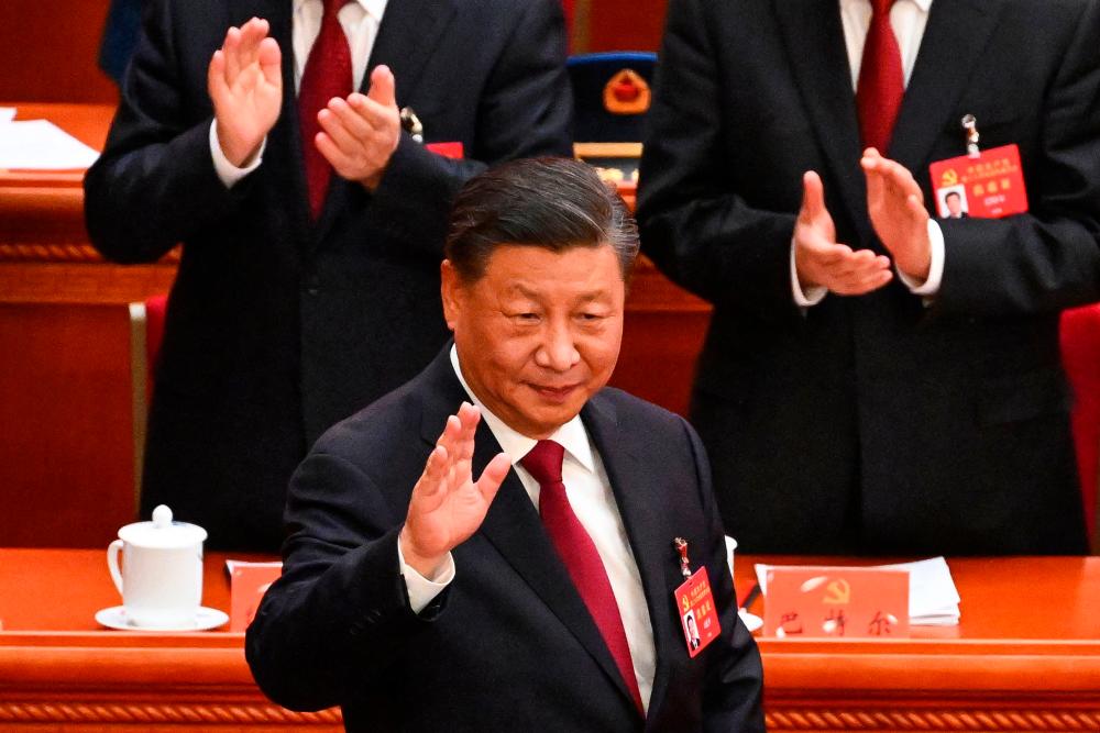 China's President Xi Jinping arrives for the opening session of the 20th Chinese Communist Party's Congress at the Great Hall of the People in Beijing on October 16, 2022. AFPPIX