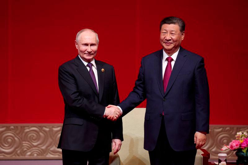 Russian President Vladimir Putin and Chinese President Xi Jinping attend the gala event celebrating 75th anniversary of China-Russia relations in Beijing, China May 16, 2024. - REUTERSPIX