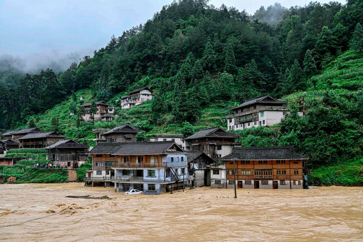 Submerged buildings at a flood-affected village in Kaili, in southwestern China’s Guizhou province on June 28, 2025. (Photo by AFP)