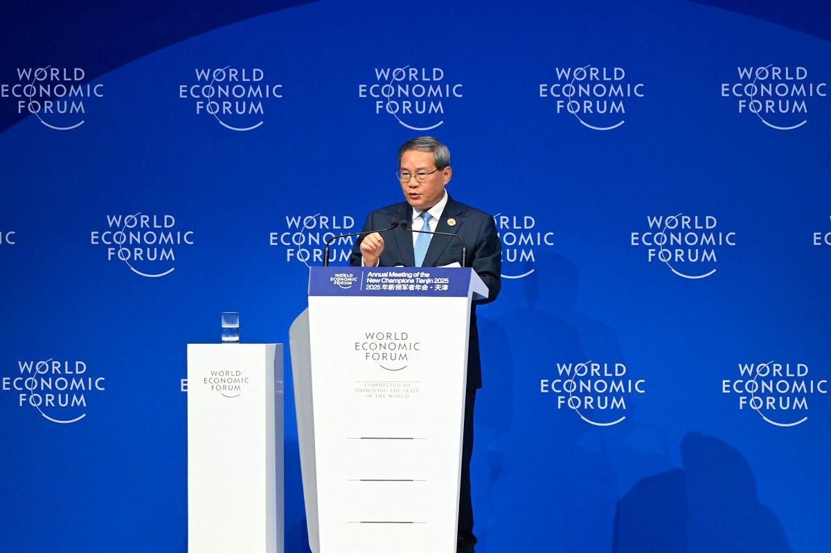 Chinese Premier Li Qiang delivers a speech during opening ceremony of the World Economic Forum Annual Meeting of the New Champions (AMNC25) in Tianjin on June 25, 2025. - Jade Gao / AFP